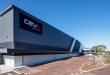 An angled view of a Ceva Logistics warehouse on a sunny day.
