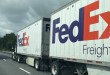 Two FedEx Freight pup trailers on a highway