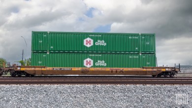 Hub Group containers on a well car
