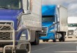 tractor-trailers pulling onto a highway