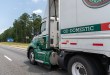 a closeup of an Old Dominion daycab pulling an Old Dominion trailer