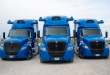 Three Aurora Driver-powered International LT trucks with roof sensor pods; Aurora plans 30,000 driverless trucks by 2030