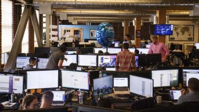 Flexport employees work at rows of monitors as the company launches an MCP server for AI agents to book freight