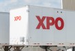 a closeup of an XPO pup trailer at a terminal