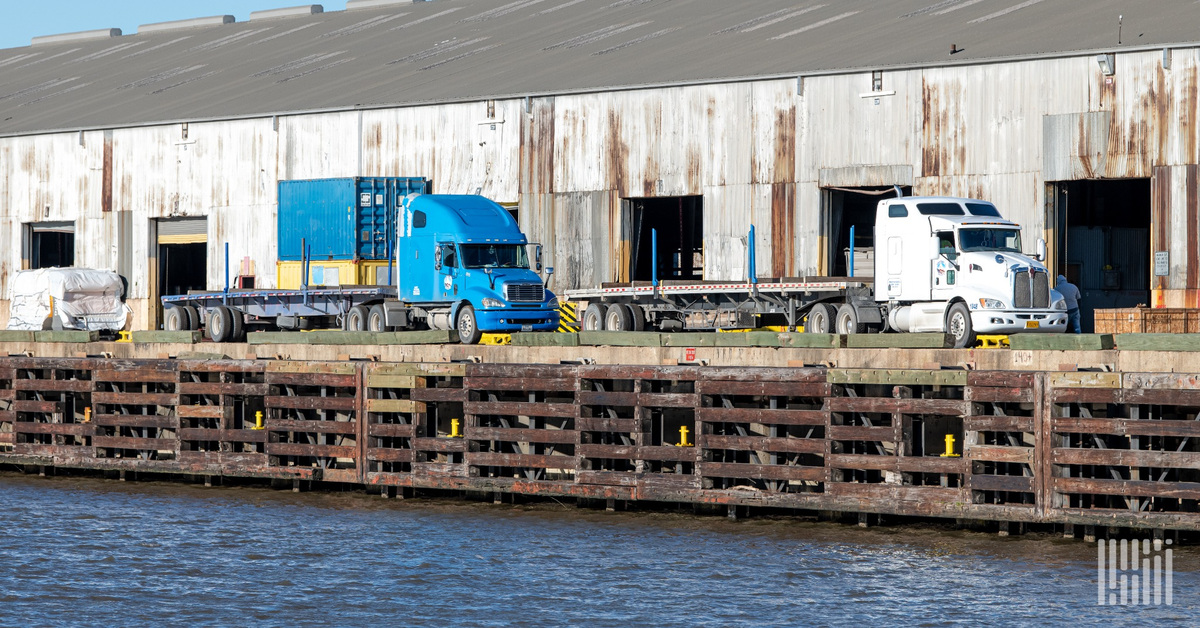 A California trucking owner used stolen identities to open credit cards and process fraudulent charges through his own company, costing two banks $2.1 million. The trucks pictured are unrelated to the case. (Photo: FreightWaves)