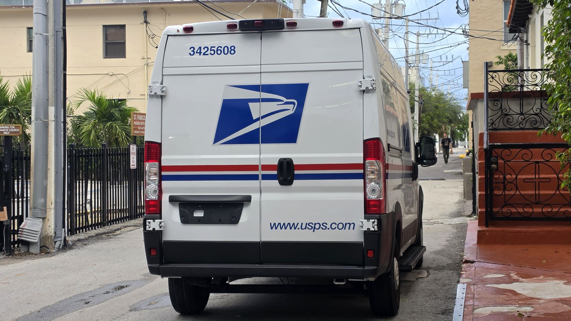 A U.S. Postal Service van stops on its route in Miami Beach, Florida, on Oct. 23, 2026. The agency says seasonal hiring along with logistics and technology improvements make it well prepared for the holiday shipping season. (Photo: Eric Kulisch/FreightWaves)