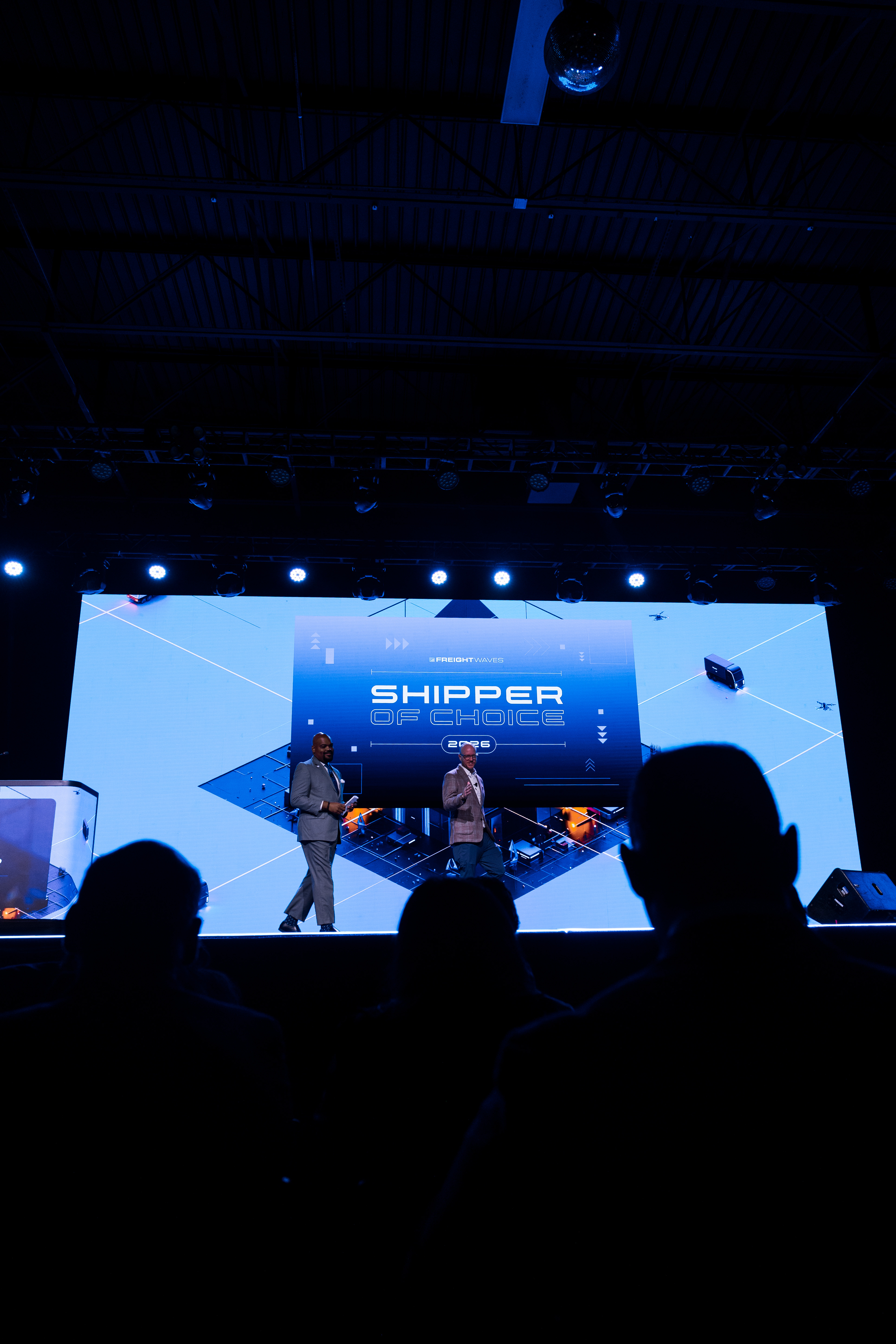 FreightWaves founder and CEO Craig Fuller stands alongside Malcolm Harris to present the Shipper of Choice awards at the F3: Future of Freight Festival in Chattanooga on Oct. 26.