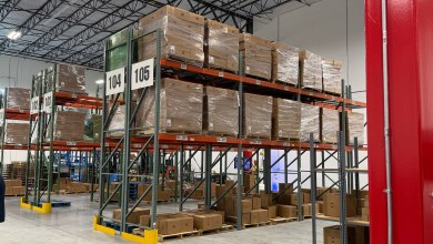 Boxed e-commerce orders at a warehouse during peak season, for a story on Kenco's 2026 consumer survey