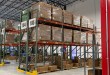 Boxed e-commerce orders at a warehouse during peak season, for a story on Kenco's 2026 consumer survey