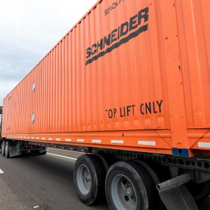 Schneider partners with Norfolk Southern; raises outlook despite Q3 miss